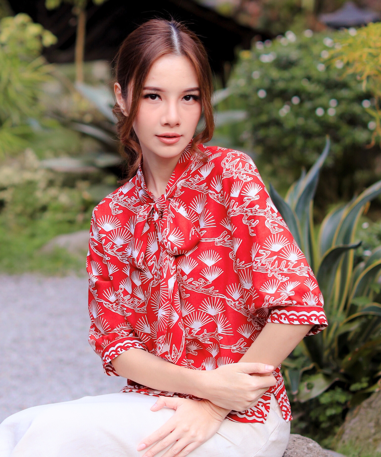 Fashion model in pink dress shirt.