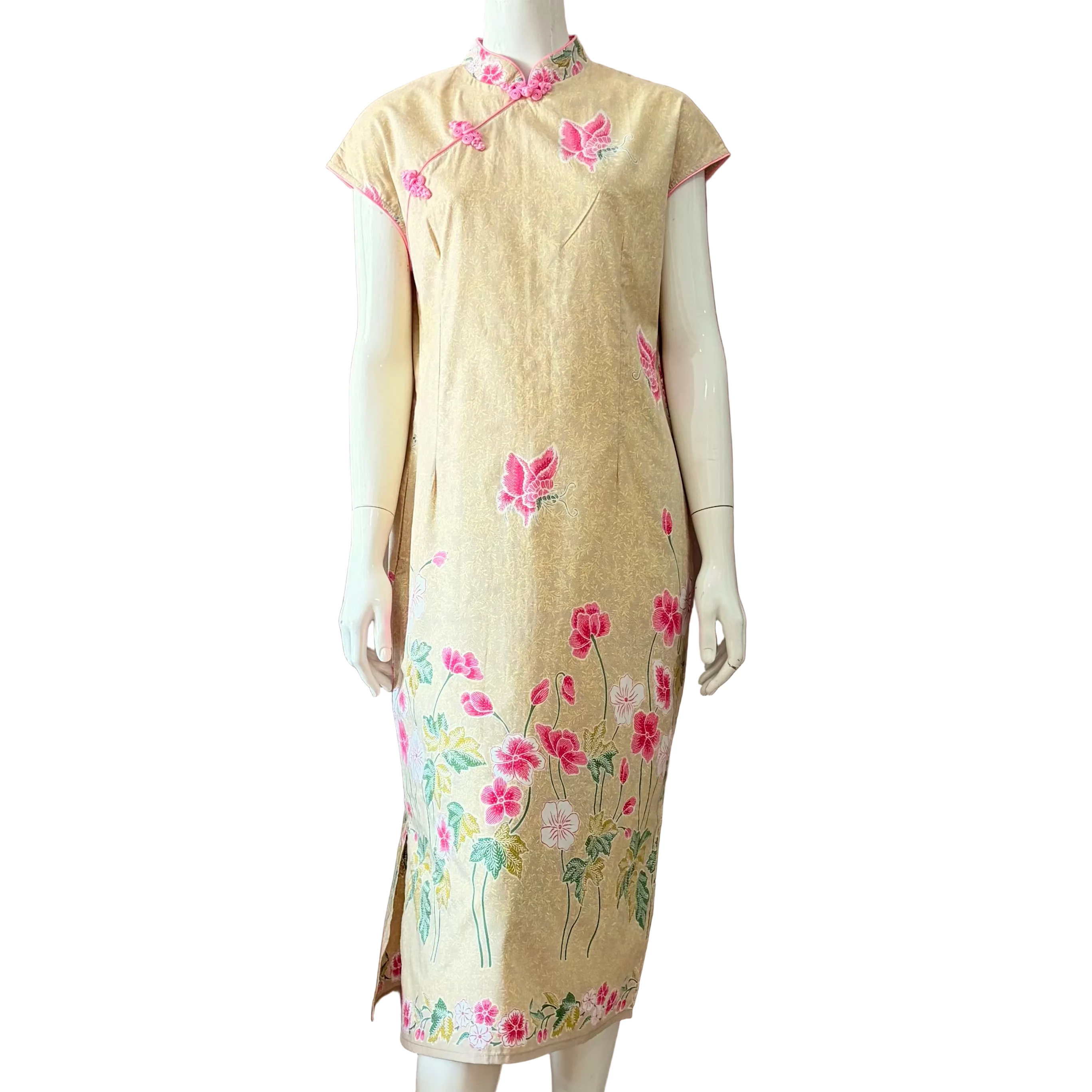 Traditional cheongsam dress with floral embroidery on a mannequin against a white background